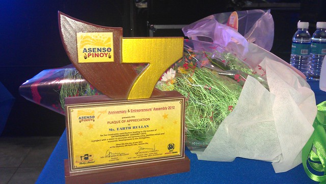 Asenso Pinoy 7th Anniversary plaque and boquet