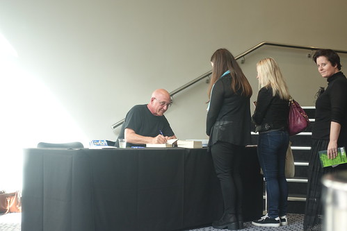 MIchael Grant at the signing desk