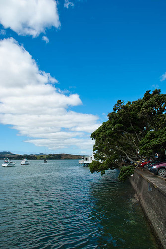 blue sea newzealand sky tree cars water clouds boat hills nz northisland mangonui