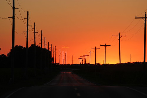 sunset silhouette poles