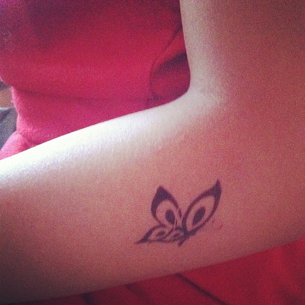 Girl with the butterfly tattoo...