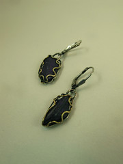 sugilite pebble earrings with wave setting