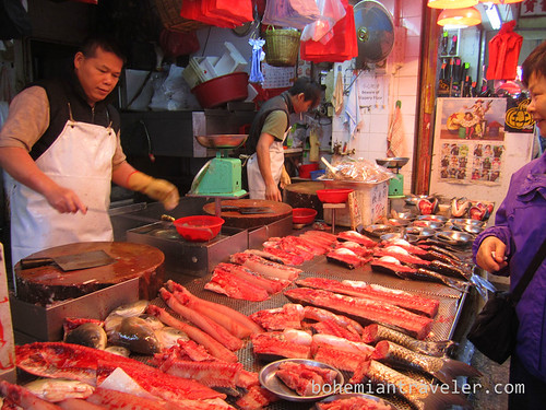 The fish Monger at Shau Kei Wan market in Hong Kong