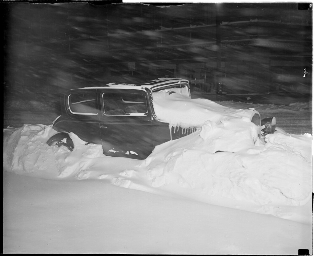 Snow covered auto