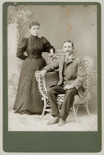 Cabinet Card pair with wicker chair