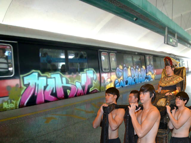 Inspecting the beautiful free grafitti on SMRT train