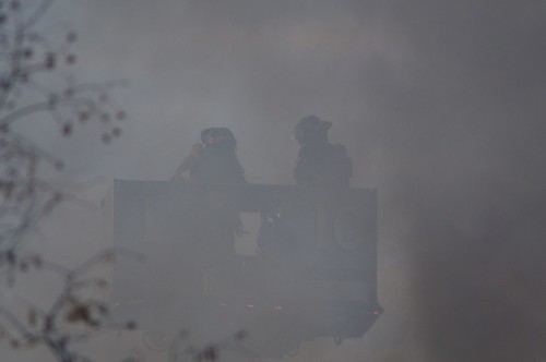 hot water fire flames heat damage trucks fighters