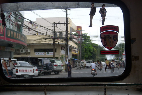 road street city window car view philippines dumaguete pedicab