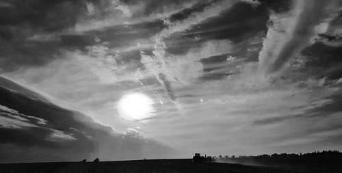 sunset sky blackandwhite monochrome clouds illinois spring outdoor farm run lonely agriculture planting farmmachinery lonelyrun cloudsstormssunsetssunrises