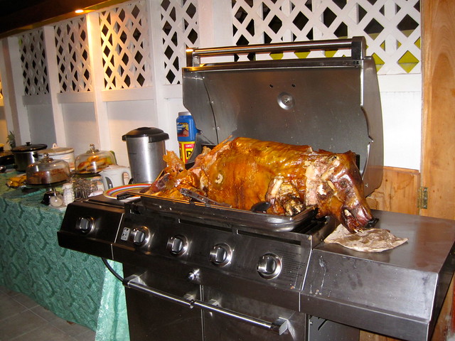 roasted pig food stand in belize