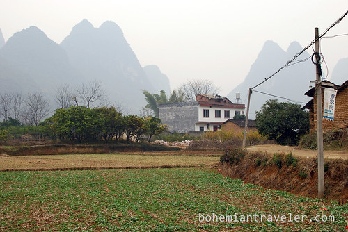 a farm and mountains around Yangshuo