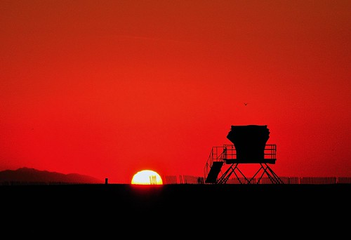 ocean california sunset red orange sun beach nature silhouette fence island catalina dusk huntingtonbeach lifeguardtower