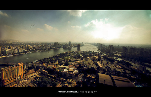 city skyline clouds photoshop river lens photography flickr cityscape egypt aerialview nile cairo tamron vanishing hdr egypte lightroom partlycloudy cityplanning autopano widelens photomatix lecaire nikond60 tamron1024 andrewashenouda