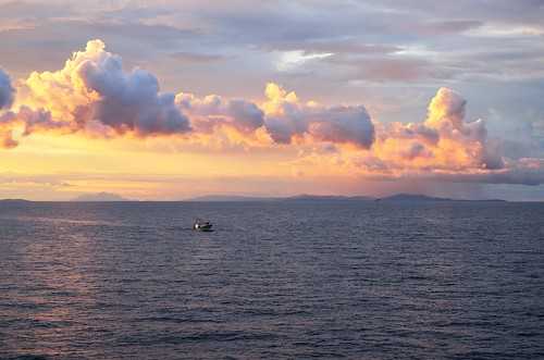 light sea sun rain clouds sunrise boat cloudy croatia afsdxzoomnikkor1755mmf28gifed nikond7000
