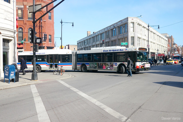 Turning at busy intersections costs buses time.