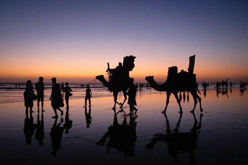pakistan sunset reflection beach silhouette asia camel getty karachi topv4444 topf100 camels clifton sindh gettyimages southasia cliftonbeach canong12