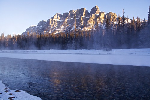 park winter light sun mountain canada castle water yellow sunrise river rockies gold rocky mount alberta bow banff
