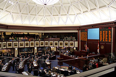 Legislators listen to the third reading of HB 5403 (Trust Funds) in the chamber of the House of Representatives on the fourth floor of the Capitol during Guardian ad Litem Day on February 9, 2012 in Tallahassee, Florida.