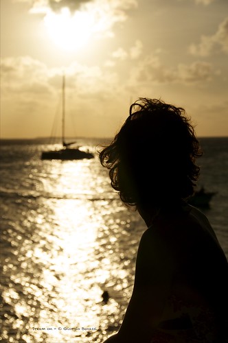 sunset woman sailboat venezuela dream losroques