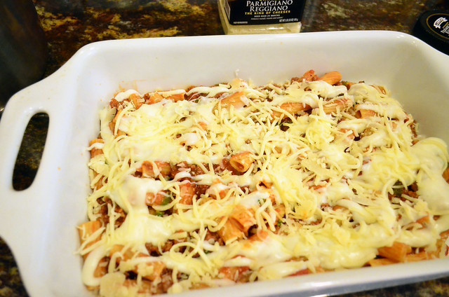 The layers are topped with cheese.