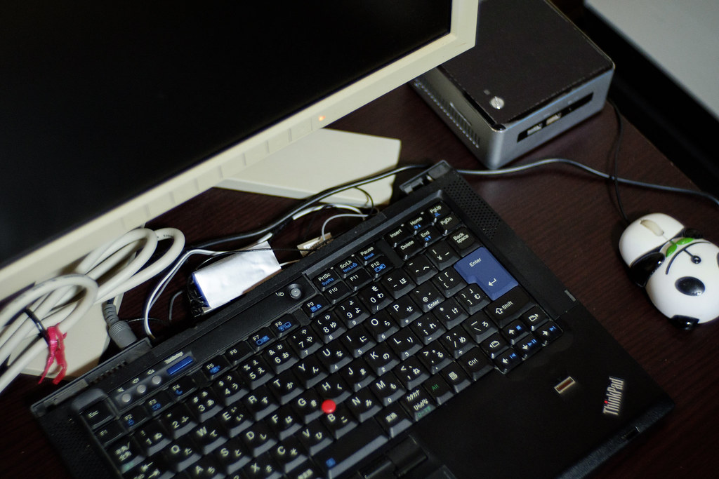 ThinkPad & NUC on desktop
