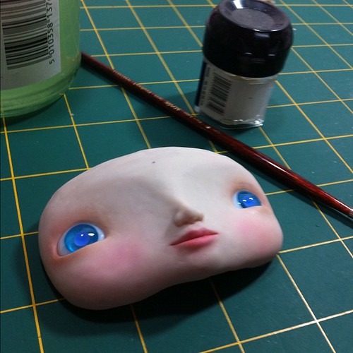 Painting her face. 8" qee custom