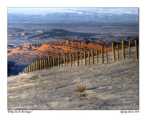 sunset snow mountains fence wyoming barbwire lander redcanyon southpass