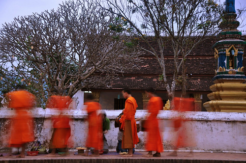 travel temple pagoda southeastasia buddhist buddhism tourists unesco worldheritagesite monastery monks offering tradition laos wat luangprabang robes morningalms laopdr nikond90 updatecollection colingrubbs sisavanvongroad