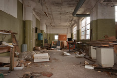 Messy factory floor. Abandoned Barber-Colman factory in Rockford, Illinois