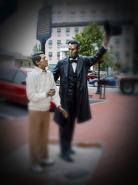 Stature of Lincoln and Tourist