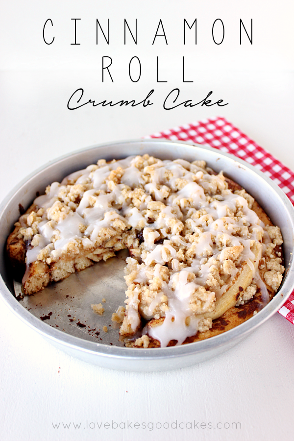 Cinnamon Roll Crumb Cake in a pan with a piece removed.