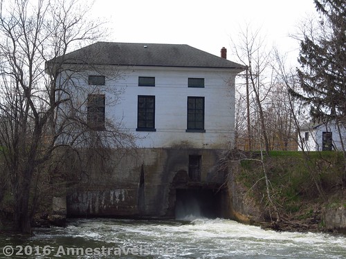 Water gushes from beneath one of the lock buildings at Lock 29 along the Eire Canal Path, Palmyra, New York
