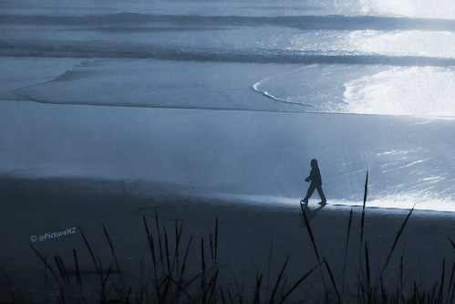 ocean blue sea newzealand christchurch sun sunlight beach monochrome silhouette sunrise walking dawn coast sand waves pacific footprints monotone canterbury nz southisland sunup daybreak blueandwhite strolling