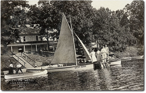 people woman usa man men history buildings boats clothing dock women furniture lakes hats indiana canoes transportation porch hotels businesses fultoncounty realphoto lakemanitou hoosierrecollections