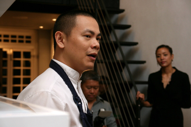 Andre Chiang and his wife in the background