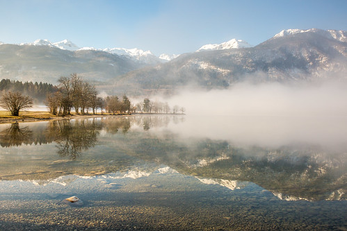 morning mist lake reflection nature water fog stone sunrise slovenia slovenija bohinj