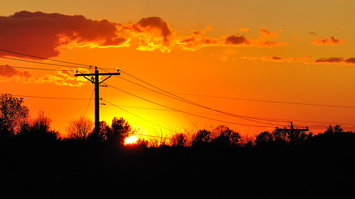 sunset orange cloud sun beautiful silhouette wow midwest iowa powerlines ia telephonepole mountpleasantia
