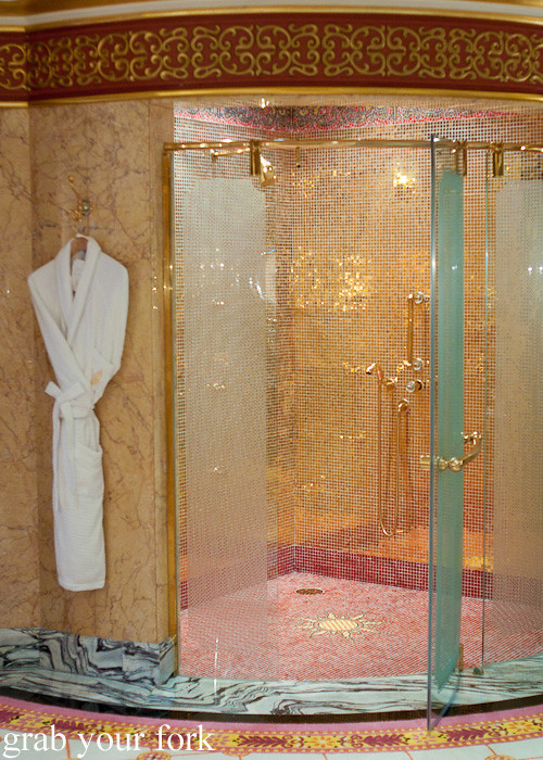 Gold-tiled shower recess in the Royal Suite of Burj Al Arab, Dubai