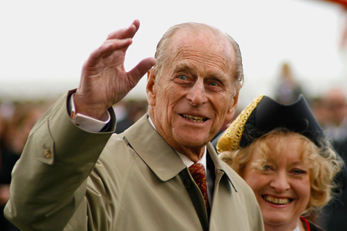 The Duke of Edinburgh waves to crowds