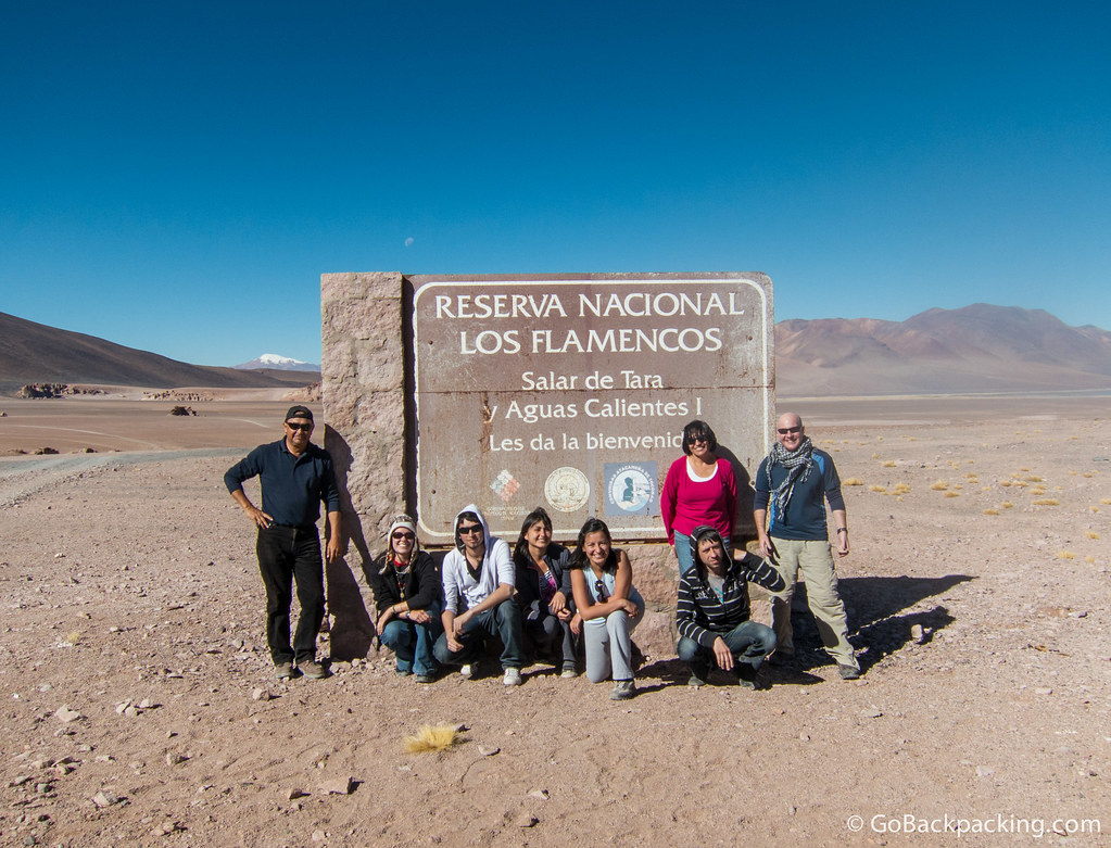 Posing by the entrance sign to Reserva Nacional Los Flamencos on our way back to San Pedro de Atacama.