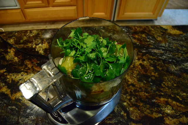 A food processor filled with ingredients.