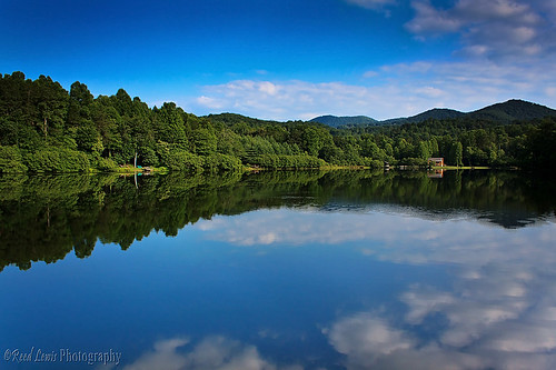 lake mountains reflection water canon landscape peaceful explore