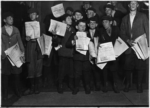 After midnight selling extras. There were many young boys selling very late these nights. Washington, D.C, April 1912