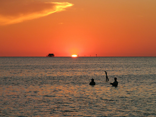 sunset sky orange gulfofmexico water silhouette clouds fishing florida fl wade wading fishcamp stilthouse portrichey orangesunset pascocounty wadefishing
