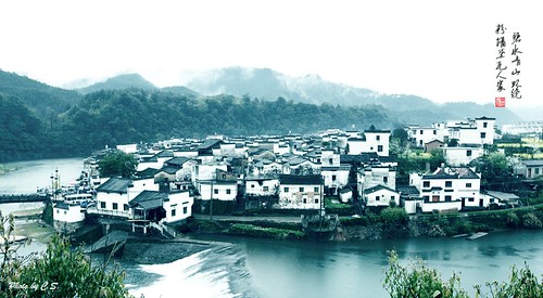 china rain clouds countryside town spring village wuyuan jiangxi rapefield