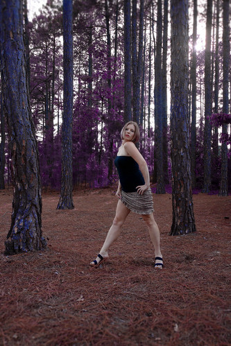 trees beauty female outdoors sinister feminine skirt heels pinestraw omgherlegs