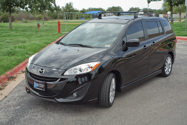 Our new family car:  2012 Mazda 5 Grand Touring