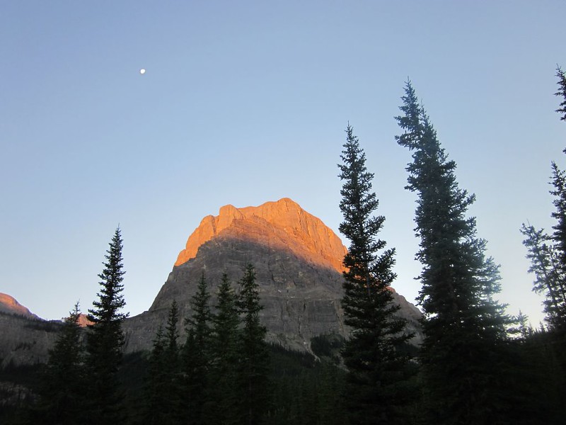 Sunrise on Block Mountain with gibbous moon at the CR37 Camp on the Cascade River