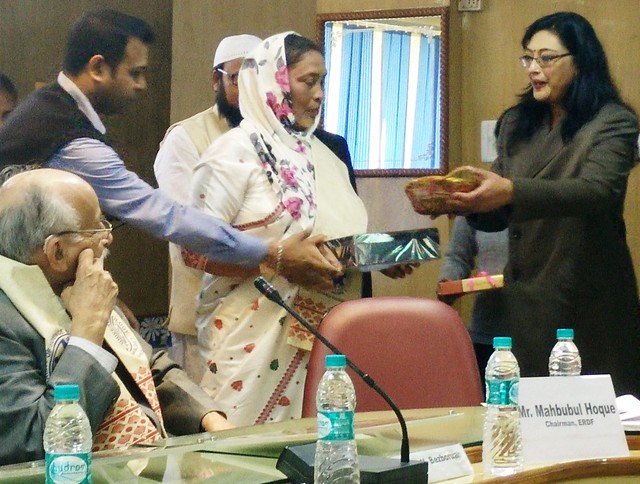 Tayabun Nisha (centre), star athlete of Assam during the post-Independent years, receiving the ERDF Excellence Award ’14 at RIST Auditorium on the outskirts of Guwahati on Saturday morning.