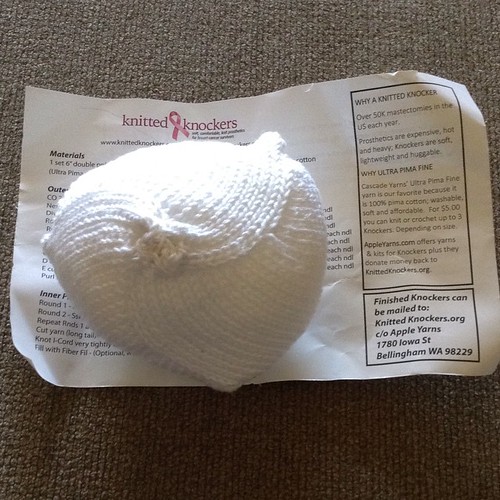 A knitted knocker as part of attending the Northern CA Knitting Retreat. This is a soft prosthesis for a woman healing after a mastectomy. Praying for whoever gets it.